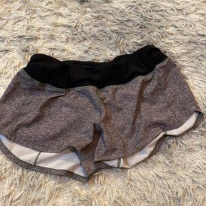 grey lululemon speed it up shorts(size 6)
